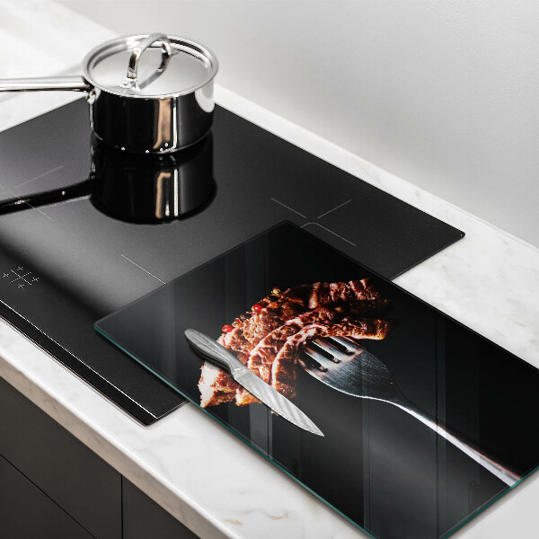 Glas Ceranfeldabdeckung Fleisch auf einer Gabel