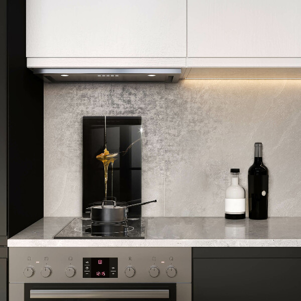 Glas Ceranfeldabdeckung Ein Teelöffel Honig