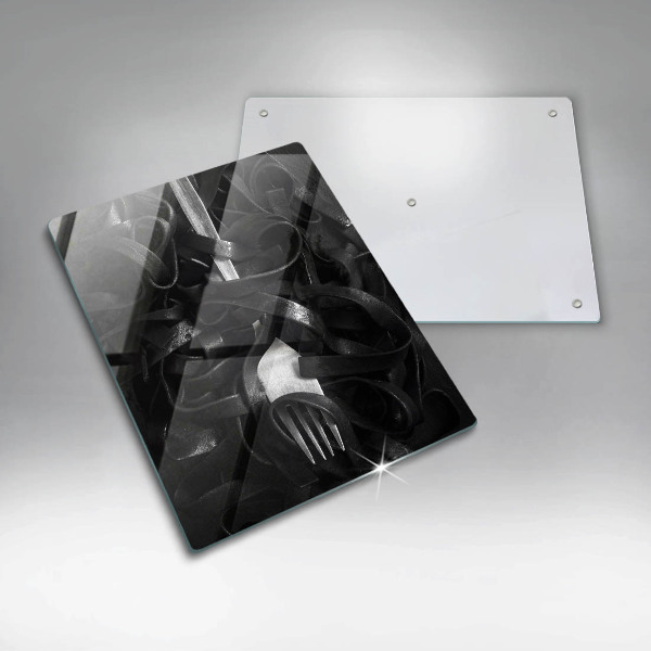 Glas Ceranfeldabdeckung Schwarze Nudeln und Gabel