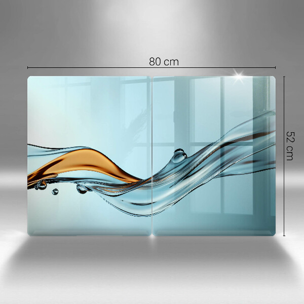 Glas Ceranfeldabdeckung Wasser auf blauem Hintergrund