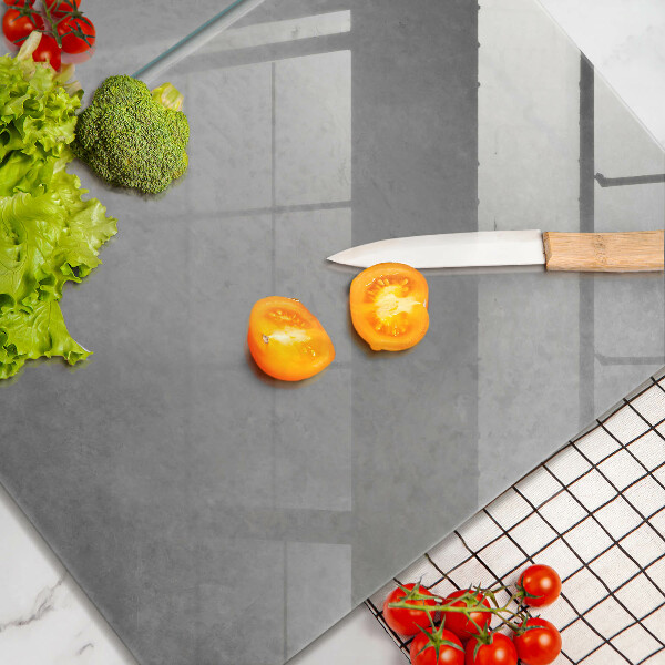 Glas Herdabdeckplatte Betonbeschaffenheitshintergrund