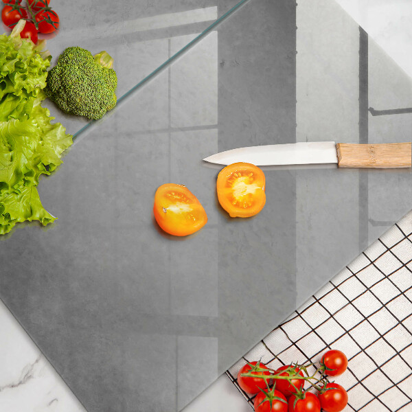 Glas Herdabdeckplatte Betonbeschaffenheitshintergrund