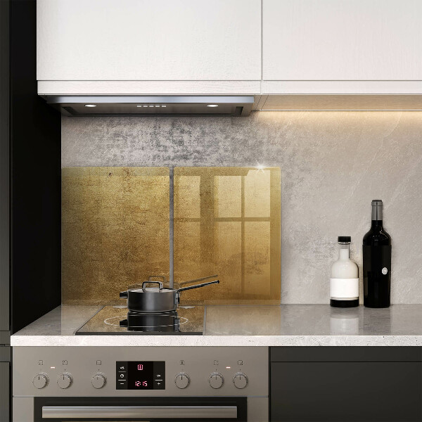 Glas Herdabdeckplatte Goldbeschaffenheitshintergrund