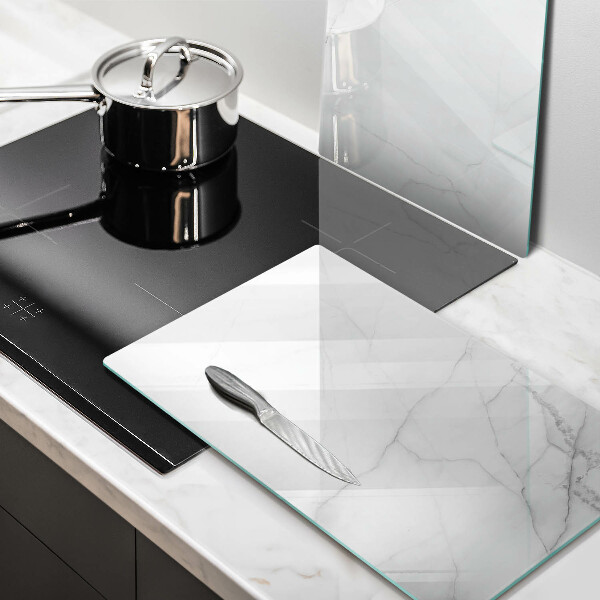 Glas Herdabdeckplatte Marmorsteinhintergrund