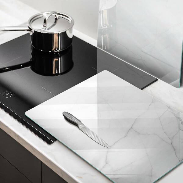 Glas Herdabdeckplatte Marmorsteinhintergrund