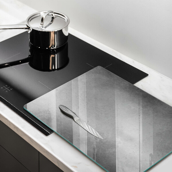 Glas Ceranfeldabdeckung Spritzschutz Betonbeschaffenheitshintergrund