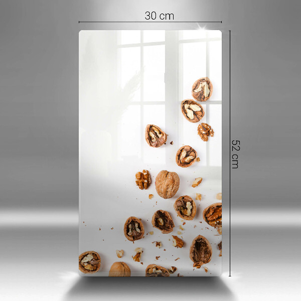 Glas Herdabdeckplatte Nüsse auf weißem Hintergrund