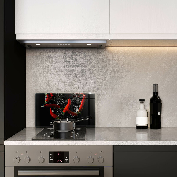 Glas Herdabdeckplatte Chilischoten in Wasser