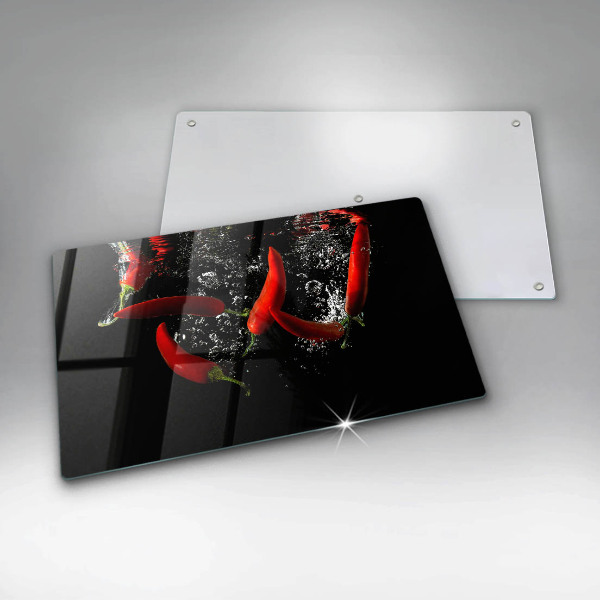 Glas Herdabdeckplatte Chilischoten in Wasser