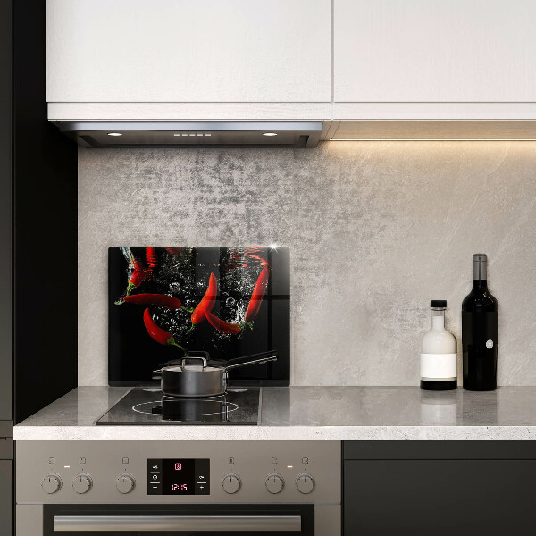 Glas Herdabdeckplatte Chilischoten in Wasser