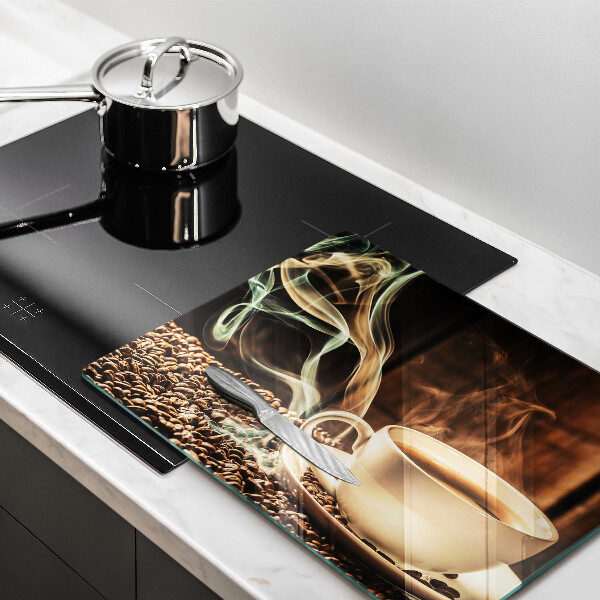 Glas Herdabdeckplatte Tasse und Kaffeebohnen