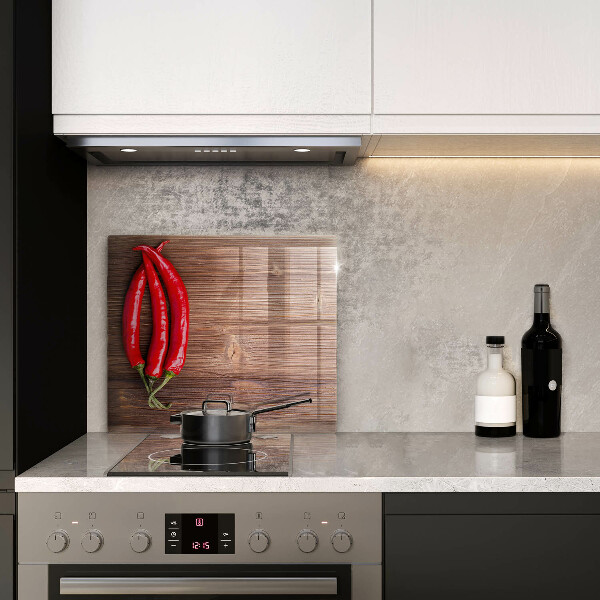 Glas Herdabdeckplatte Chilischoten auf Holz