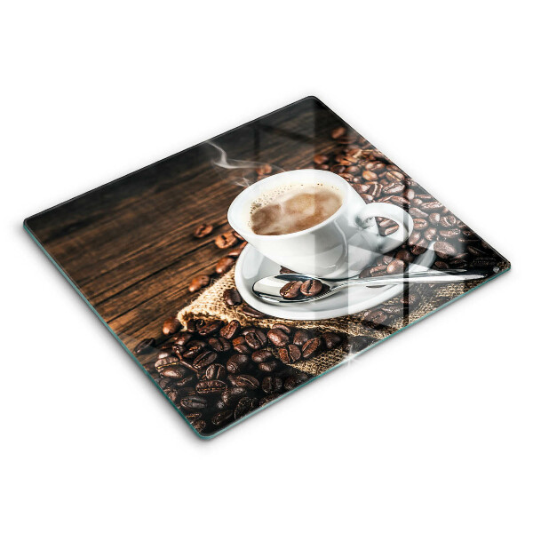 Glas Ceranfeldabdeckung Tasse und Kaffeebohnen