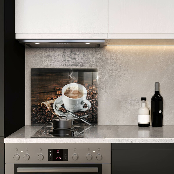 Glas Ceranfeldabdeckung Tasse und Kaffeebohnen