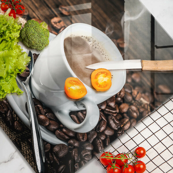 Glas Ceranfeldabdeckung Tasse und Kaffeebohnen