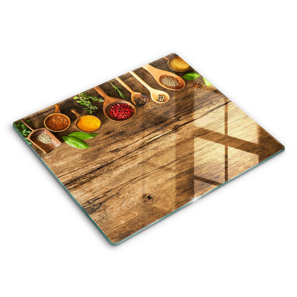 Glas Herdabdeckplatte Holzlöffel mit Gewürzen