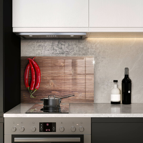 Glas Herdabdeckplatte Chilischoten auf Holz