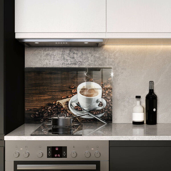 Glas Ceranfeldabdeckung Tasse und Kaffeebohnen