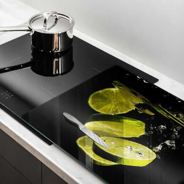 Glas Ceranfeldabdeckung Limetten im Wasser