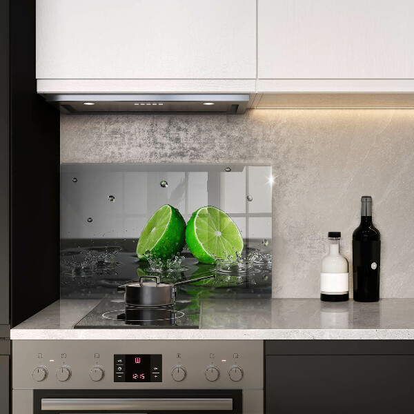Glas Herdabdeckplatte Saftige Limetten und Wasser