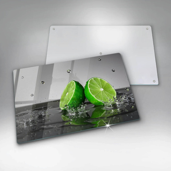 Glas Herdabdeckplatte Saftige Limetten und Wasser
