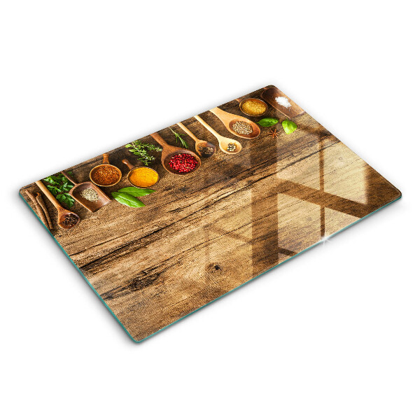 Glas Herdabdeckplatte Holzlöffel mit Gewürzen
