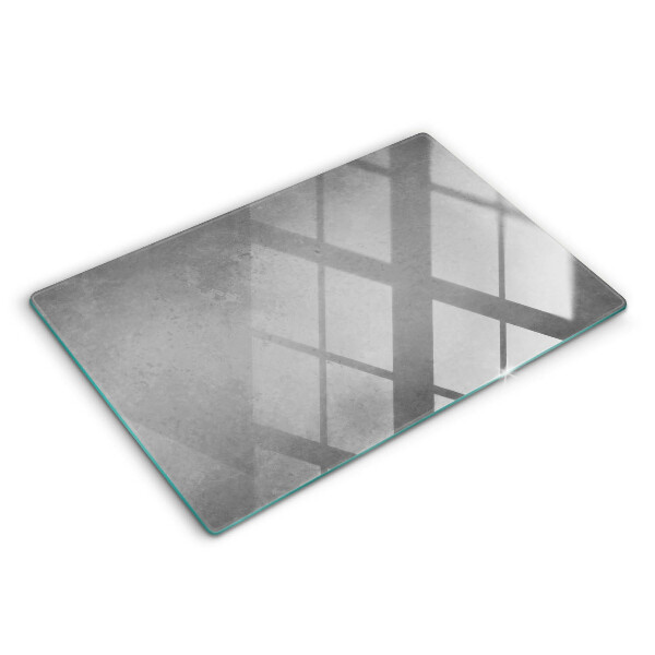 Glas Herdabdeckplatte Betonbeschaffenheitshintergrund