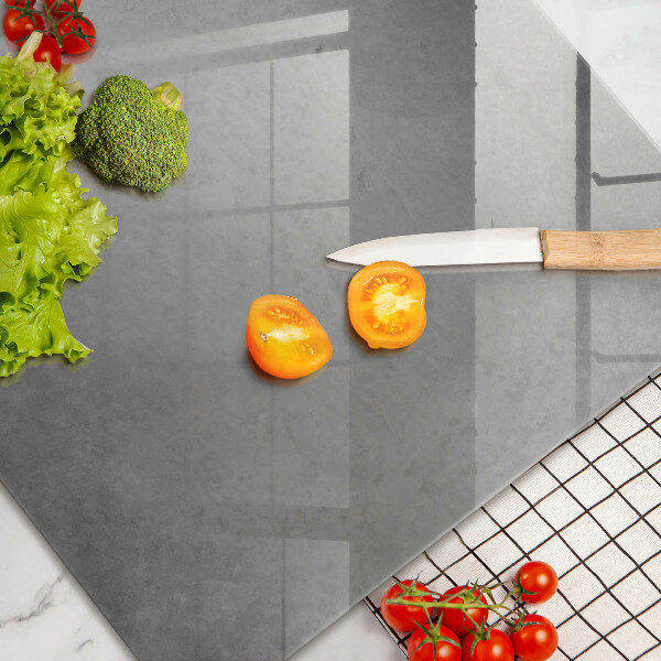 Glas Herdabdeckplatte Betonbeschaffenheitshintergrund