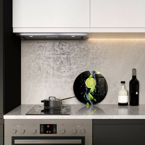 Glas Herdabdeckplatte Saftige Limetten in Wasser