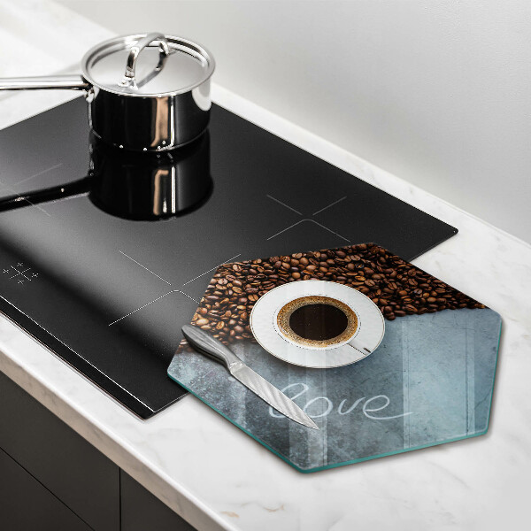 Glas Herdabdeckplatte Kaffeebohnen und Tasse