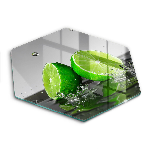 Glas Herdabdeckplatte Saftige Limetten und Wasser