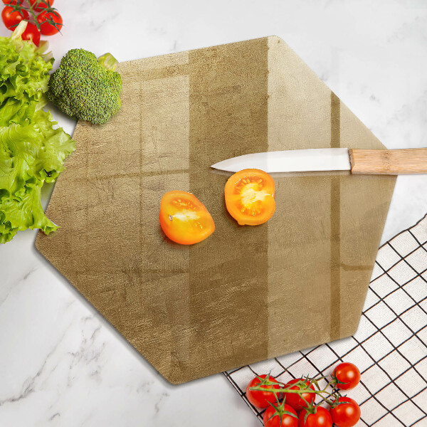 Glas Herdabdeckplatte Goldbeschaffenheitshintergrund