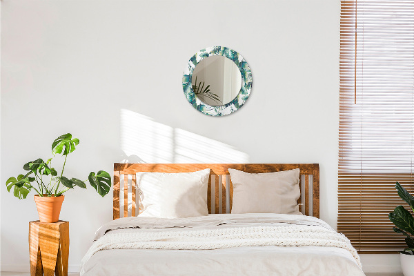 Runder spiegel mit dekorativem aufdruck Blätter