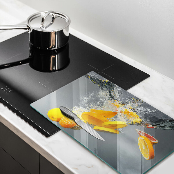 Herdabdeckplatte glas Zitronen im Wasser