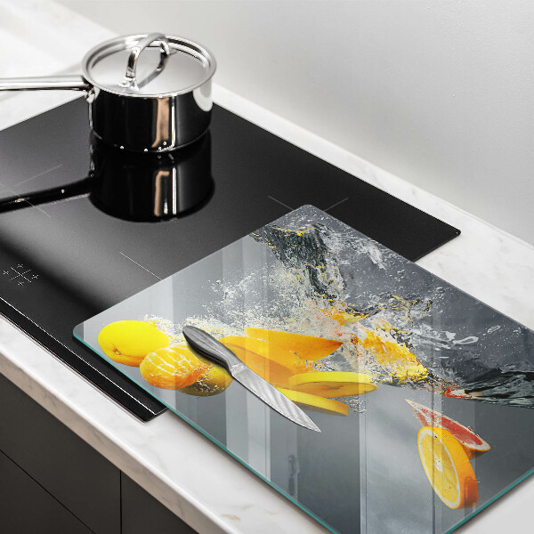 Herdabdeckplatte glas Zitronen im Wasser