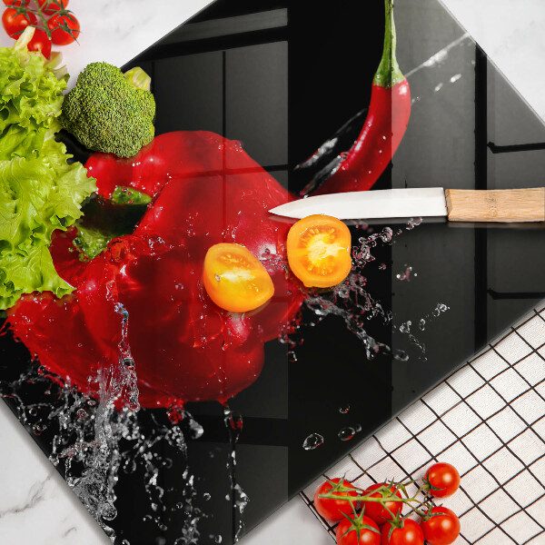 Herdabdeckplatte glas Rote Paprika in Wasser