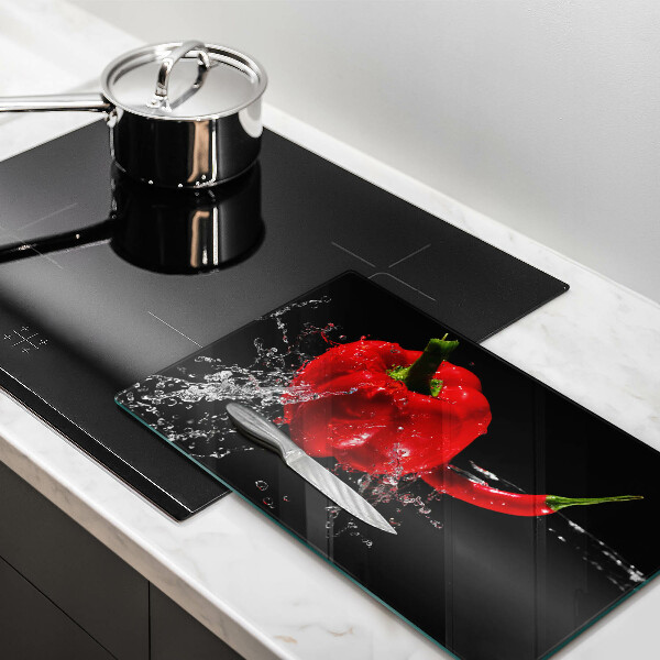 Herdabdeckplatte glas Rote Paprika in Wasser