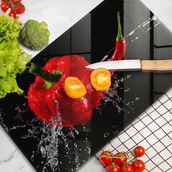 Herdabdeckplatte glas Rote Paprika in Wasser