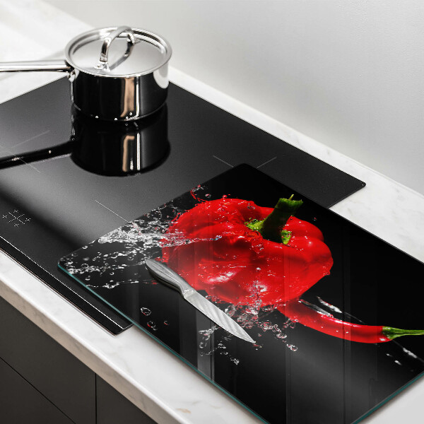 Herdabdeckplatte glas Rote Paprika in Wasser