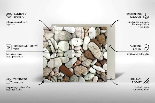 Herdplattenabdeckung Kleine Steine im Hintergrund
