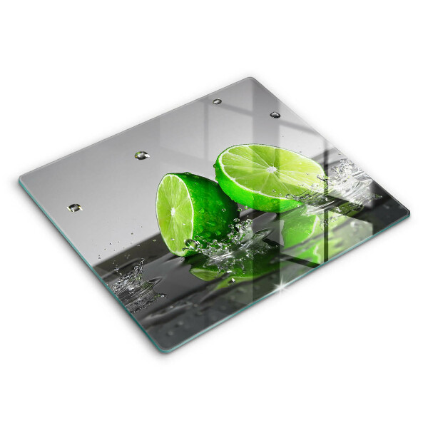 Herdplattenabdeckung Saftige Limetten und Wasser