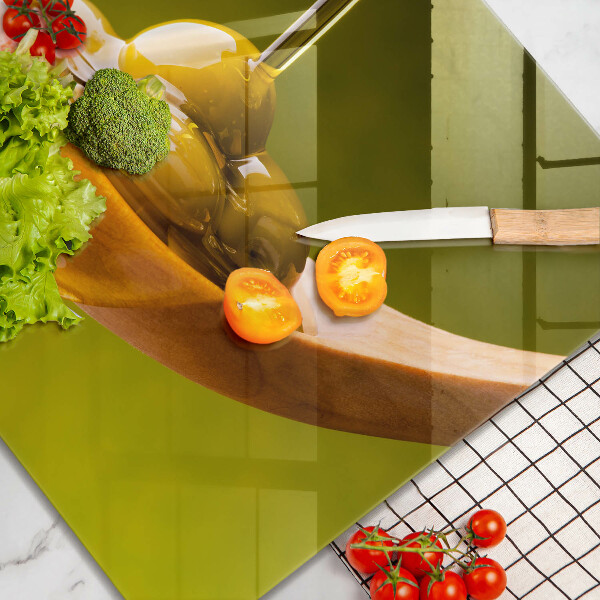 Herdplattenabdeckung Olivenöl und Oliven