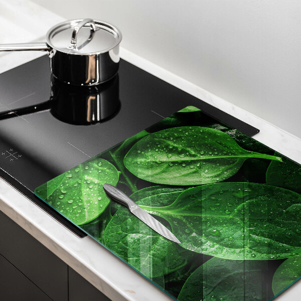 Herdplattenabdeckung Basilikumblätter