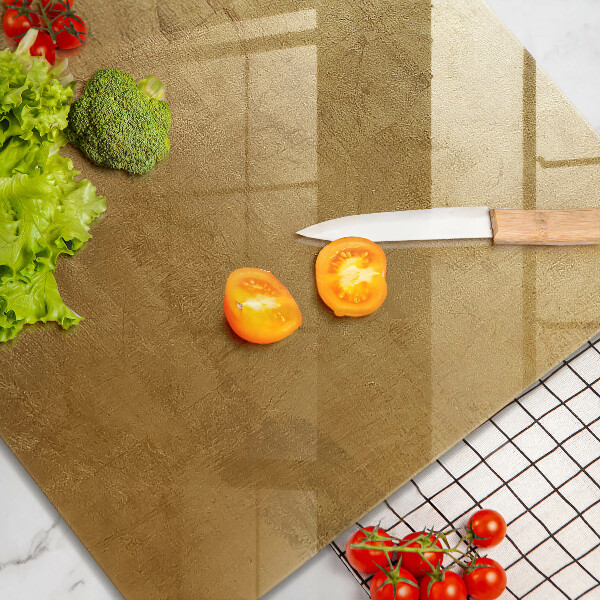 Herdplattenabdeckung Goldbeschaffenheitshintergrund