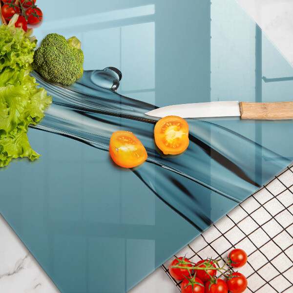 Herdabdeckplatte glas Wasser auf blauem Hintergrund