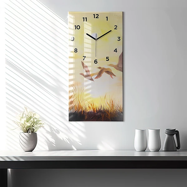 Vertikale Uhr Kraniche bei Sonnenuntergang