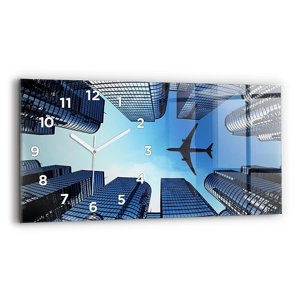 Horizontale Uhr mit motiv Flugzeug über Gebäuden