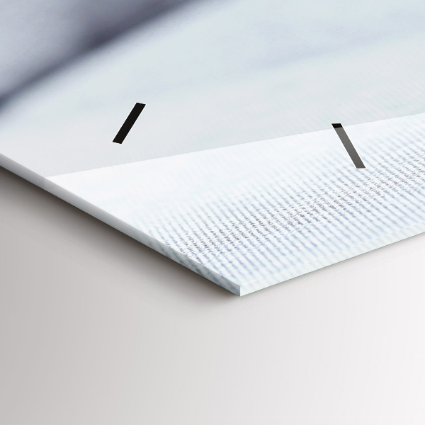 Horizontale Uhr Katze auf einem Sofa