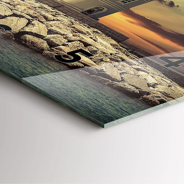 Wanduhr quadratisch Leuchtturm am Meer