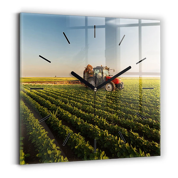 Wanduhr quadratisch mit motiv Traktor sprüht ein Feld